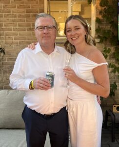 Chelsey and her father celebrating her engagement